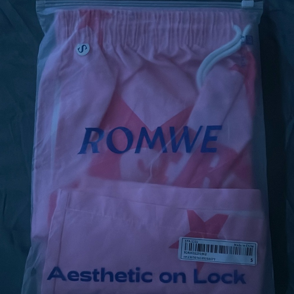 I’m selling a pink ROMWE superstar pair of shorts